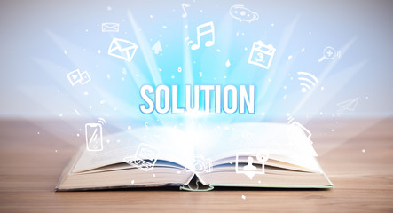 Opeen book with SOLUTION inscription, business concept