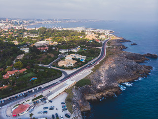 Beautiful aerial vibrant view of Boca Do Inferno (Hell's Mouth), Cascais, District of Lisbon, Portugal, shot from drone