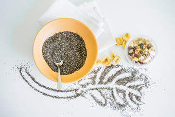 Healthy Chia seeds in bowl on the table close-up