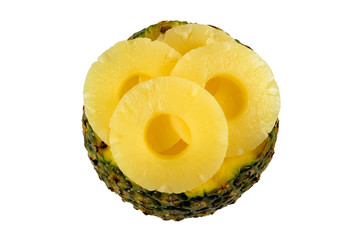 Sliced canned pineapple isolated on white. Fresh fruit. Top view.