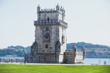 Obraz premium View of Belem district, civil parish of the municipality of Lisbon, Portugal, with Belem Tower, Torre de Belem in Portuguese, a prominent example of the Portuguese Manueline style