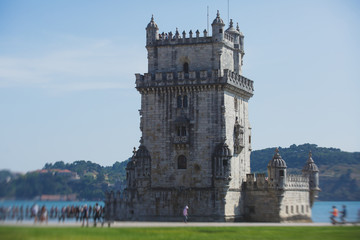 Obraz premium View of Belem district, civil parish of the municipality of Lisbon, Portugal, with Belem Tower, Torre de Belem in Portuguese, a prominent example of the Portuguese Manueline style