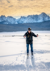 Cross skiing with VR goggles and controllers in a winter wilderness