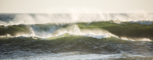 Closeup of Waves and Spray at sunset