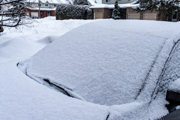 Windshield of Car Covered in Snow