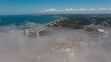 Punta este mansa skyline from above the clouds