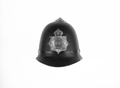 Traditional British Bobby Police Helmet Isolated On White Background
