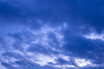 Obraz premium dramatic cloudy sunset sky blue hour abstract background