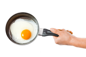 a pan in hands on a white background