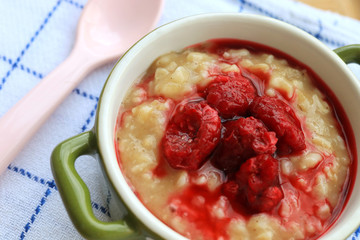 Tasty oatmeal porridge with raspberries