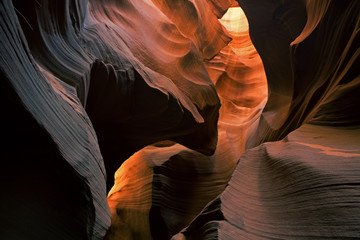 Landscape of Water Holes Slot Canyon aglow with reflected sunlight, Arizona, USA