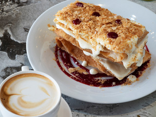 Napoleon with raspberry sauce