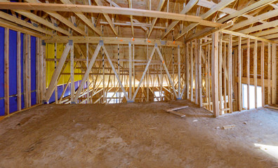 Fototapeta na wymiar Framing beam of new house under construction interior of roof structure interior construction
