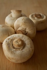 Mushrooms on a wooden cutting board