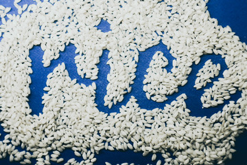 Rice texture. Word written from food. Classic blue pantone