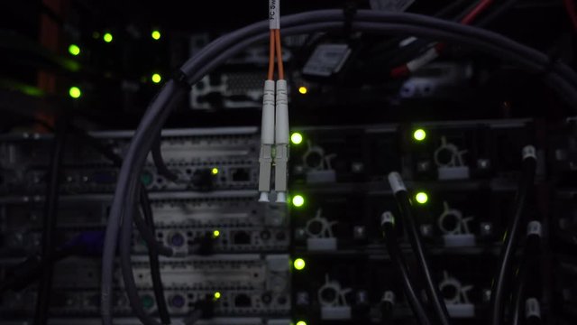 Fibre Channel fc switch on datacener server rack background.