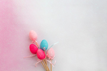 Easter composition. Colorful eggs on a colored background