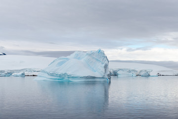 Antarctic landscape with iceberg, view from expedition ship © Alexey Seafarer
