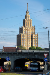 RIGA, LATVIA - MAY 25, 2016: city street with cars and building of the Academy of Sciences