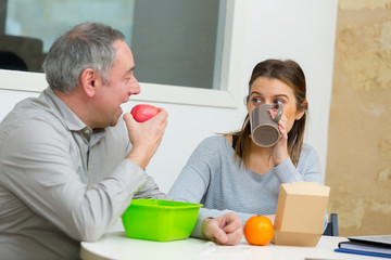 workers with lunch pack in the office