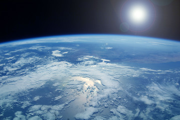 Earth atmosphere from space Elements of this image were furnished by NASA.