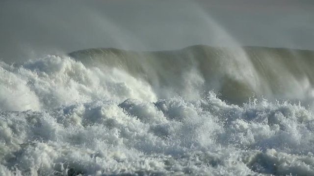 Wave sea spray sunlight sea stormy ocean big wave foam slow-motion