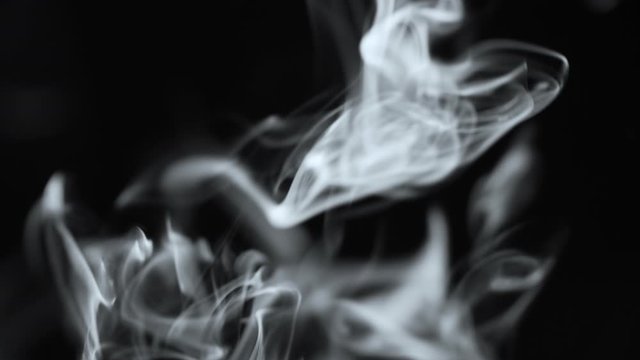 Smoke slow motion on Black background abstract