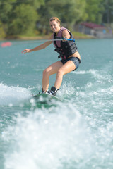 portrait of a young woman water skiing