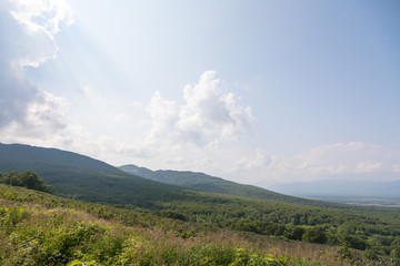 Fototapeta premium Hills in the distance, Kamchatka Peninsula, Russia.