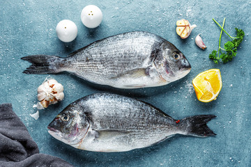 Fresh dorado fish with ingredients