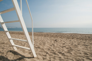 beach landscape with lifeguard ladder on the beach, and space to write