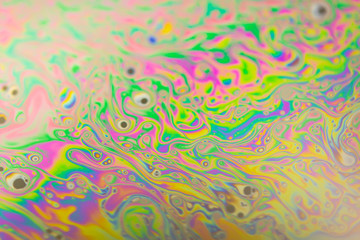Naklejka premium Close up soap bubble background. Psychedelic abstract background