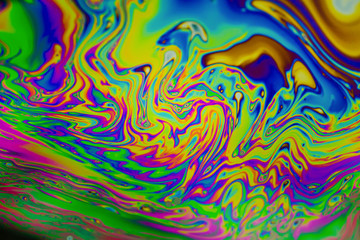 Fototapeta na wymiar Psychedelic abstract background. Photo macro shot with light interference on the surface of a soap bubble
