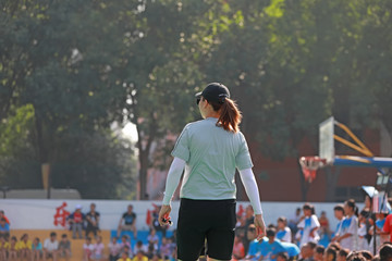 Female referees in juvenile handball matches, Luannan County, Hebei Province, China