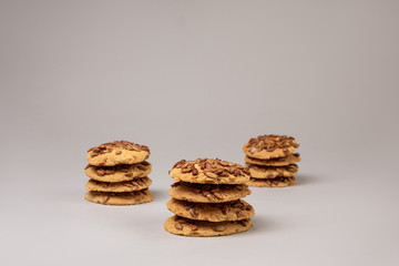 Stacks of fresh tasty cookies with seeds