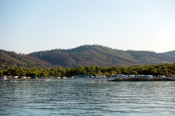 People enjoying the beach in Platanitsi camping, Sithonia, Greece