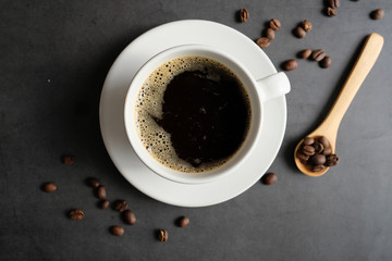 Coffee cup and beans top view with copyspace . flat lay espresso for menu, background, banner and advertisement. brew caffeine drink and modern style.feine drink and modern style.