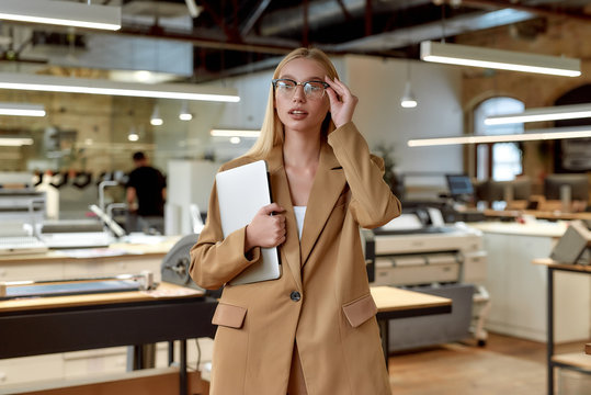 Stay Humble, Work Hard. Cheerful Businesswoman Posing In Office