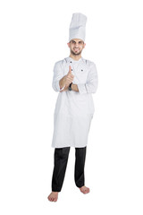 Male chef showing thumb up in studio
