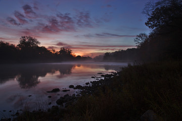 Fototapeta na wymiar The early sunrise on the Grand River, shot in Kitchener, Ontario, Canada.