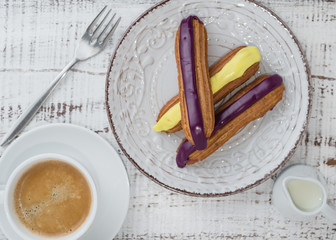 traditional french eclairs with currant and lemon. Top view
