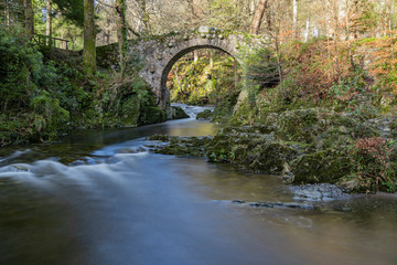 Long exposure of Foleys bridge and Shinma river, Tollymore forest park, Newcastle, County Down,...