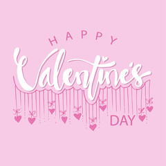 Valentines day lettering on pink background.
