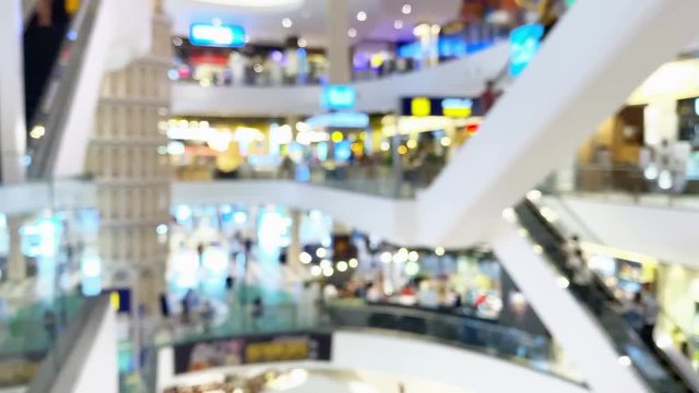 Blurred shopping mall hall. Abstract blur beautiful modern luxury shopping mall and retails store interior for background. department store indoor. shopping mall.vacation weekend day