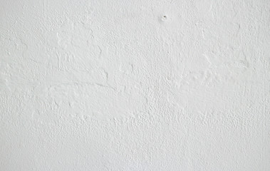 Soft texture of white cement surface as background 