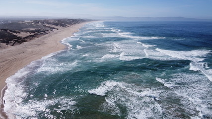 waves breaking on the beach