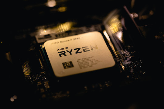 Fujiang, China - February 17, 2020: Close-up of AMD Ryzen 3000 Series CPU on motherboard. It is a high-performance microprocessor introduced by AMD in 2019.