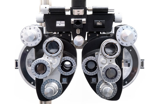 A Phoropter, the eye examination machine in an optometrist's office to measure vision correction isolated on white