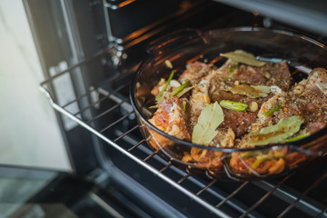 Shashlik marinated for grill in onion, herbs and spices. Raw pork meat for spicy shish kebab . Sauce marinated Pork rib chop into pieces.