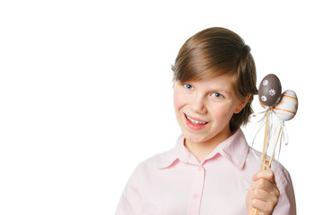 Girl with easter eggs in hands on white background